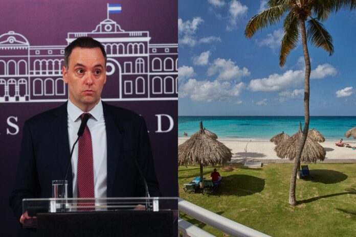 investigan-viaje-adorni-aruba-hotel-lujo Fachada de un hotel en la playa de Aruba, destino del viaje investigado.