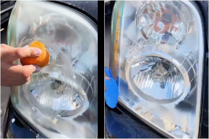 Persona frotando media naranja con bicarbonato sobre un faro de auto opaco.