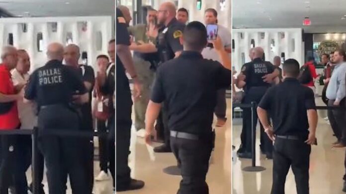 Miembros de la delegación de Egipto discuten con policías de Dallas en un hotel